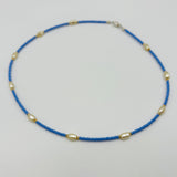 Kylie Necklace in Royal Blue with Creme Pearl Ovals and Gold Accent