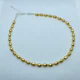 Nora Necklace in Golden Pearl