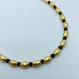 Nora Necklace in Golden Pearl with Black