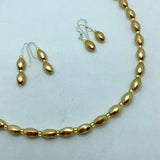 Olivia Earrings in Golden Pearl